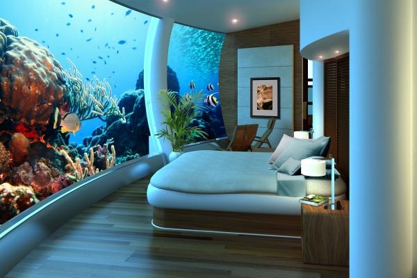 Снимка: poseidonresorts.comПодводната стая в комплекс „Poseidon“ (Undersea Resort Nautilus Suite)ФиджиВъпреки, че засега тази стая е само проект, въпросния хотел, който се строи върху частен остров във Фиджи, обещава да стане първият в света подводен луксозен еко-курорт. Съоръженията ще включва 75 стаи и апартаменти, ресторант / бар, библиотека / дневна, спа център, сватбен параклис и театър. В допълнение към наземните апартамента, курортът ще създаде този подводен апартамент, обзаведен в стила на романите на Жул Верн.   